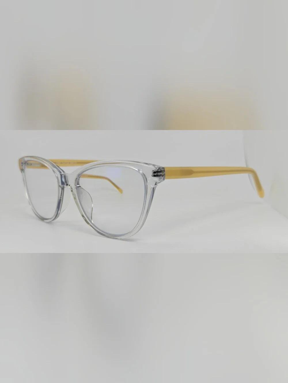 Sing. Clear Cat-Eye Reading Glasses with Vanilla Temples. Minimalist.